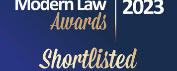 a blue background with the words modern law awards 2023 shortlisted paralegal of the year.