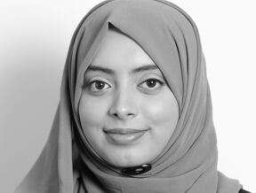 A black and white photo of Saadia Sharmin in a hijab.