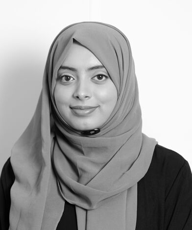 A black and white photo of Saadia Sharmin in a hijab.