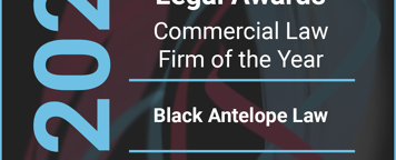 a black, red and blue poster with the words 2023 business awards UK legal awards finalist commercial law firm of the year - black antelope law.