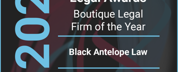 a black, red and blue poster with the words 2023 business awards UK legal awards finalist boutique legal firm of the year - black antelope law.